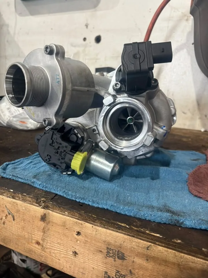 Turbocharger removed from a vehicle and sitting on the bench at AutoNorth in North Bay